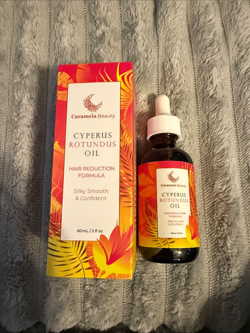 Caramela Beauty Cyperus Rotundus Oil Serum — Yellow & Orange Bottle